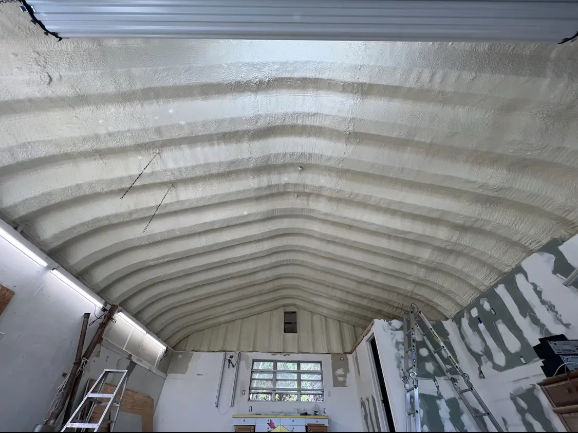 Spray polyurethane foam applied to the underside of a metal roof deck in Moncks Corner